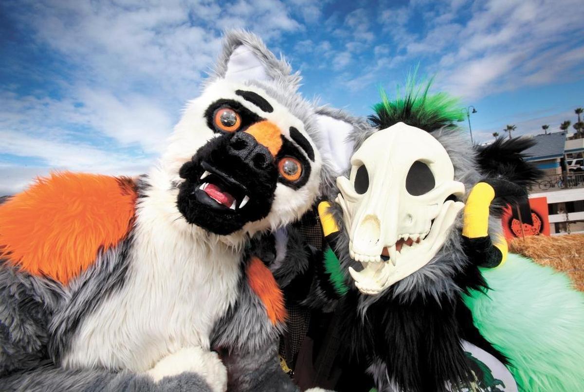 Tevor Greene of Orcutt and Britt Judy of Grover Beach show off their Halloween costumes in Pismo Beach in 2017.