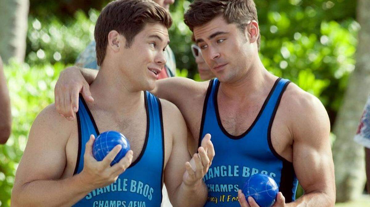 Zac Efron, right, and Adam Devine are lovable idiots in “Mike and Dave Need Wedding Dates.”
