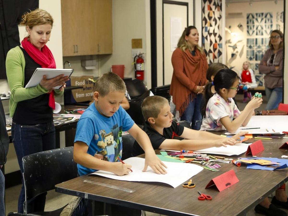 San Luis Obispo artist Sydney Hall, left, leads an Art on the Spectrum workshop in March 2017 at the San Luis Obispo Art Museum.