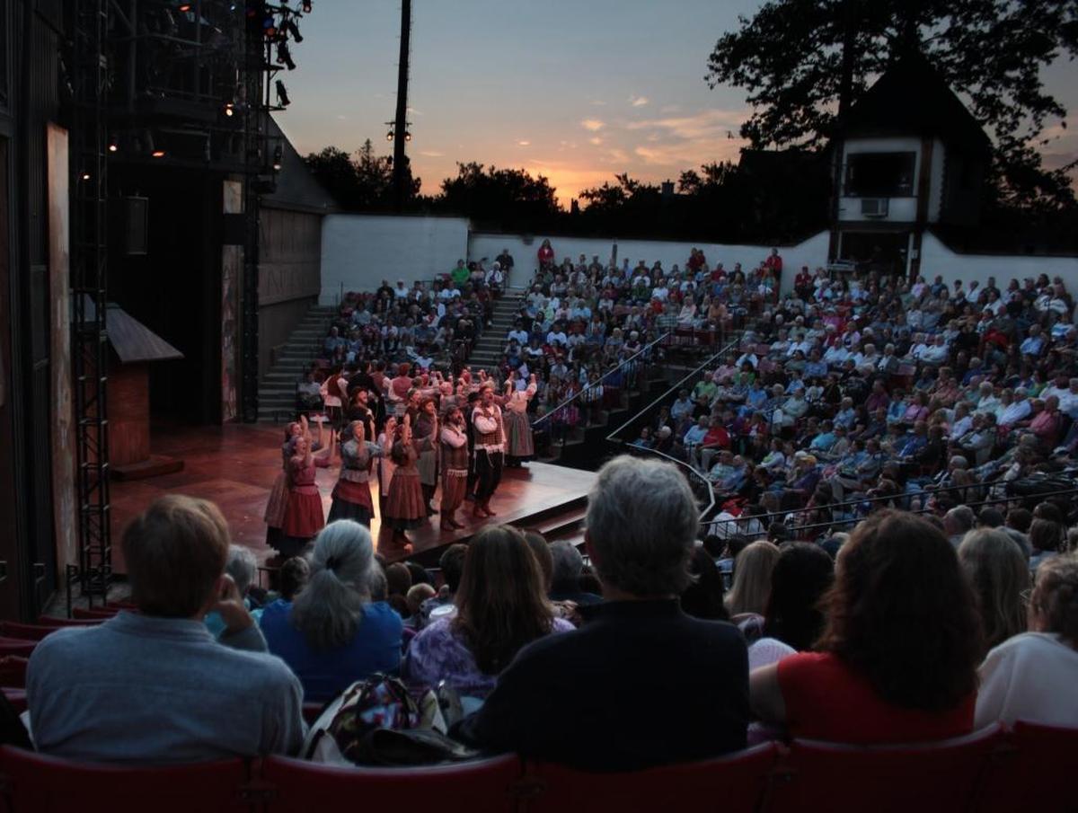 Audience members watch a PCPA-Pacific Conservatory Theatre production of “Fiddler on the Roof” at Solvang Festival Theater in 2013.