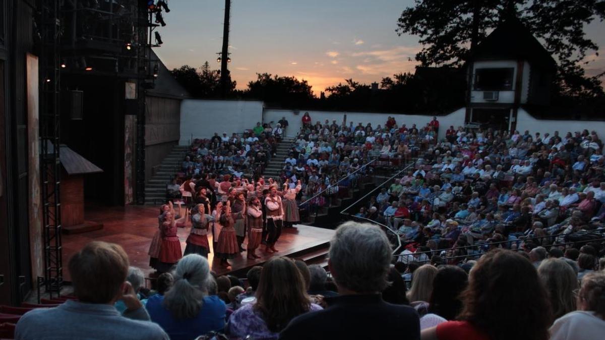 Audience members watch a PCPA-Pacific Conservatory Theatre production of “Fiddler on the Roof” at Solvang Festival Theater in 2013.