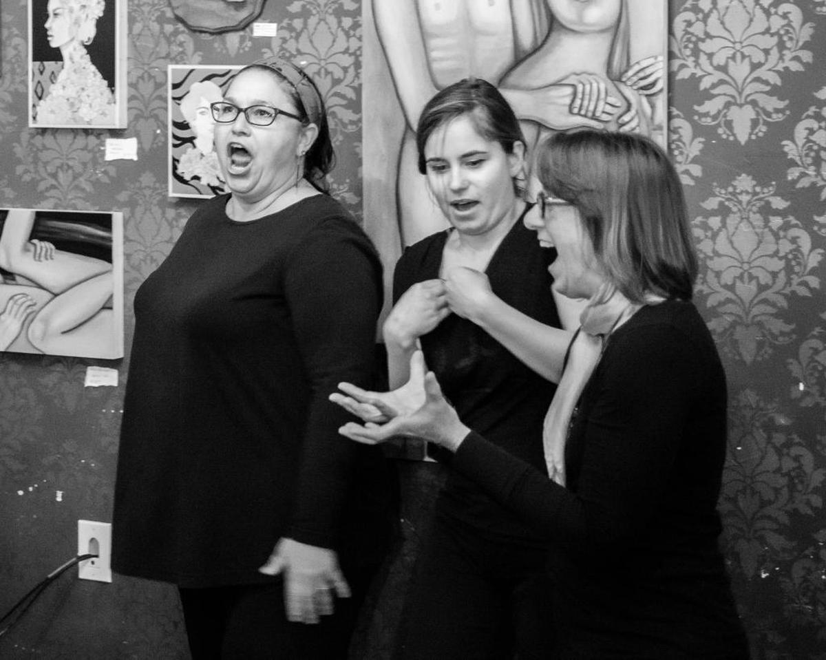 Members of the Central Coast Comedy Theater troupe perform at Kreuzberg Coffee Co. in San Luis Obispo.