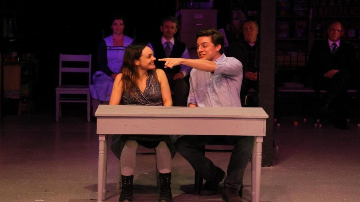 Emily (Erin Parsons) and George (Cameron Parker) chat at the soda shoppe in a scene from “Our Town,” playing at San Luis Obispo Little Theatre.