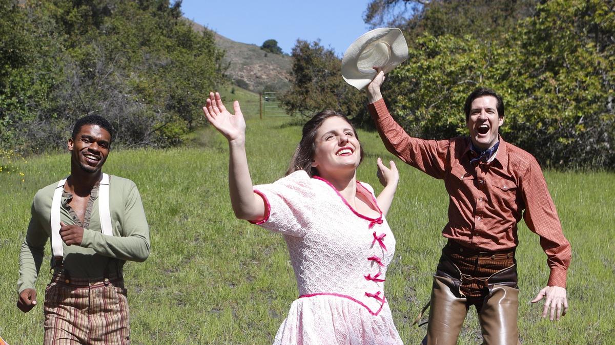 The love triangle between Jud (William Powell III), Laurey (April Amante) and Curly (Gabriel Manro) is at the heart of "Oklahoma!", playing May 12 and 13 at the Performing Arts Center in San Luis Obispo. The actors are pictured at La Cuesta Ranch in San Luis Obispo.