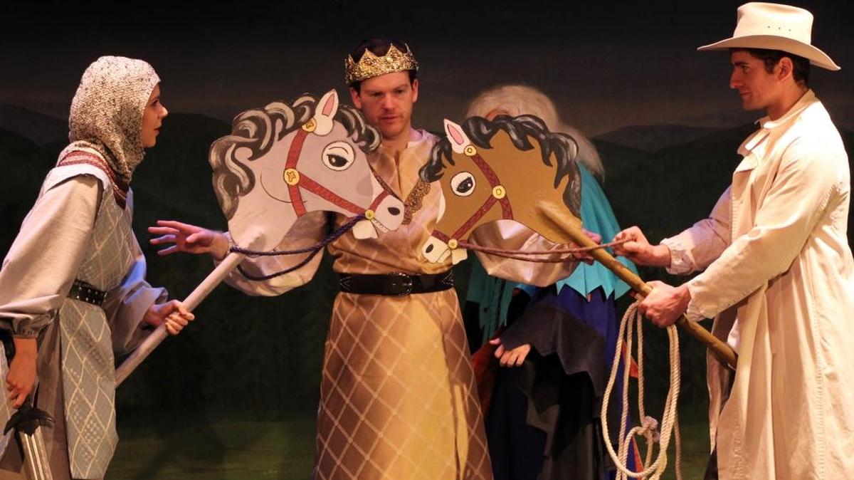 King Arthur (Mike Fiore), center, oversees a duel between a knight (Rachel Tietz), left, and Hank Morgan (Jeffrey Salsbury) in “A Connecticut Yankee in King Arthur’s Court,” playing at the Great American Melodrama and Vaudeville in Oceano.