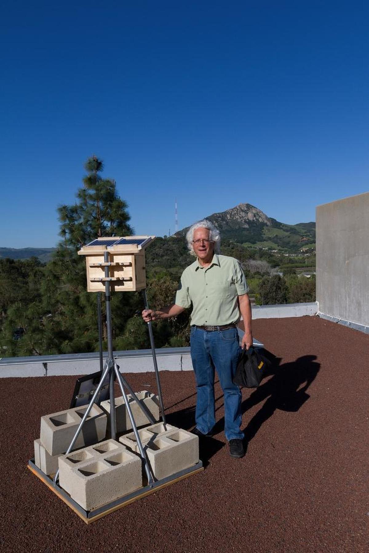 Cal Poly professor Brian P. Lawler poses for a photo. He rigged up a camera on the roof of the university’s Kennedy Library to capture about 70,000 photos of Bishop Peak in San Luis Obispo over the course of a year.