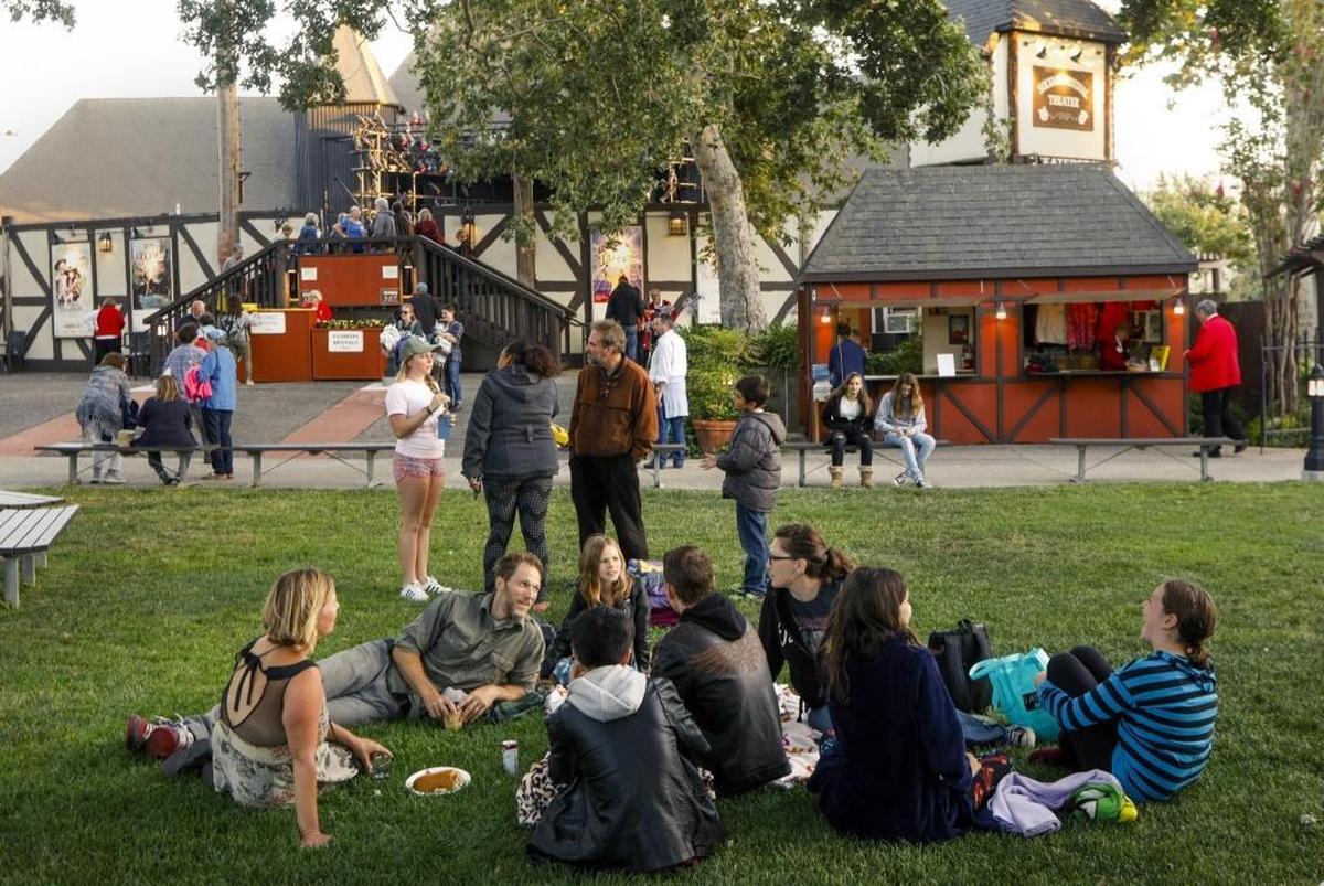 Theatergoers chat and eat before a performance of “Lend Me a Tenor The Musical” at Solvang Festival Theater.