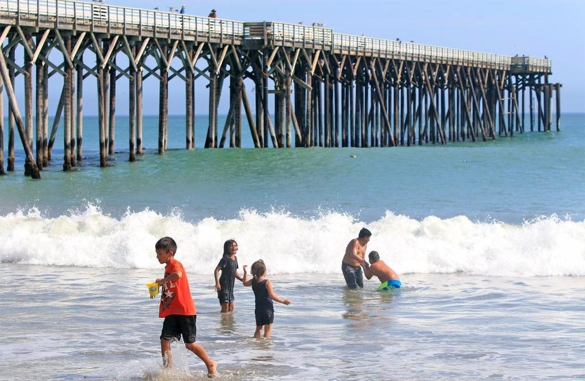 A warm, sunny beautiful day greets pier walkers and beach goers at San Simeon State Beach. Gregory Randall dropped to his knee on the San Simeon Pier to propose to his girlfriend in 2009 — and then dropping the ring through the pier’s deck boards to the surf below.