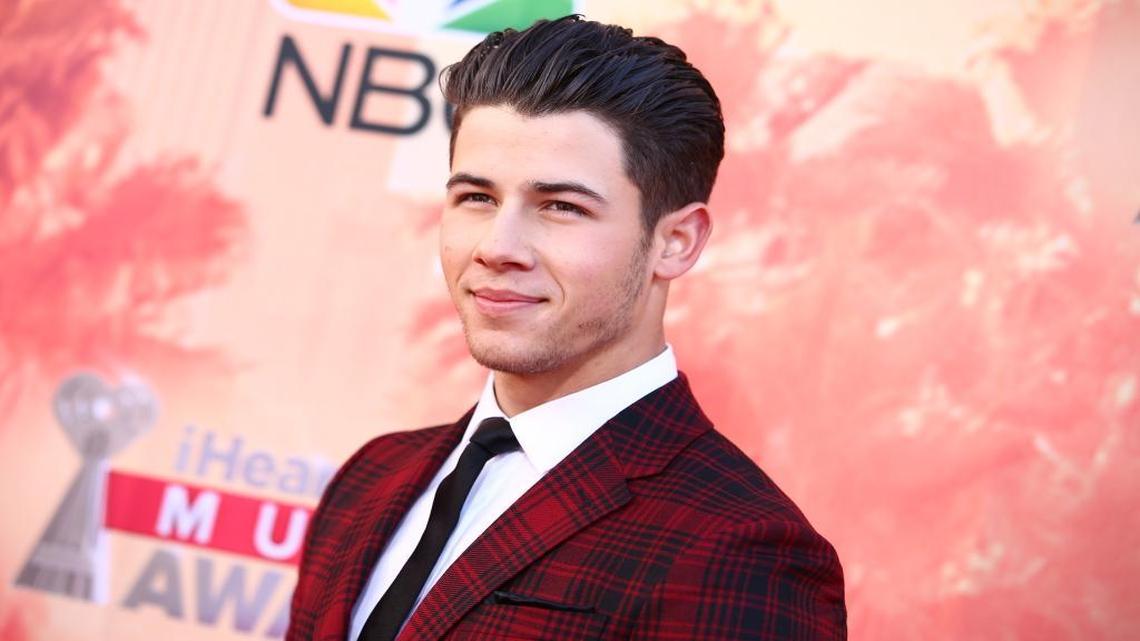 Nick Jonas arrives at the iHeartRadio Music Awards at The Shrine Auditorium on Sunday, March 29, 2015, in Los Angeles. He was apparently in the South County on Monday to shoot a new music video.