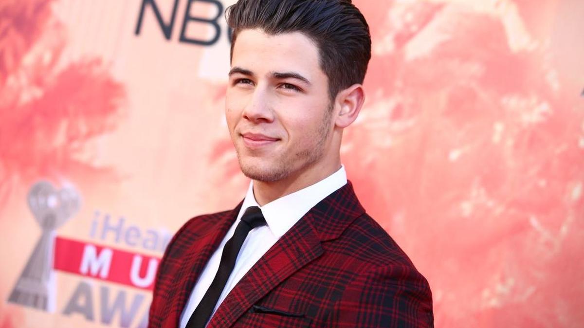 Nick Jonas arrives at the iHeartRadio Music Awards at The Shrine Auditorium on Sunday, March 29, 2015, in Los Angeles. He was apparently in the South County on Monday to shoot a new music video.