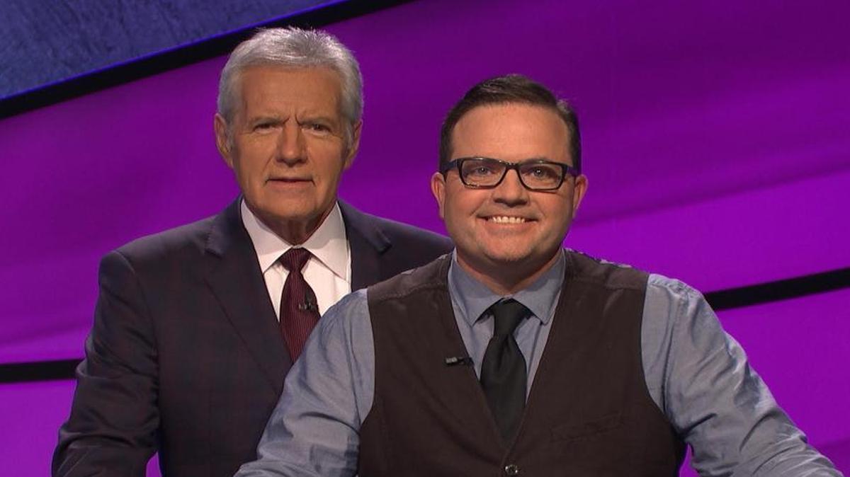 San Luis Obispo engineer Doug Groshart, right, poses with Jeopardy! host Alex Trebek.