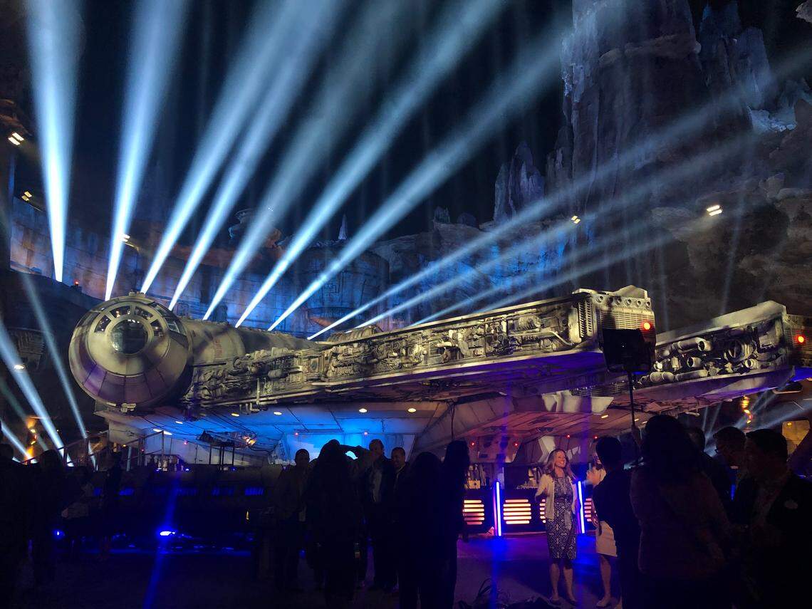 The Millenium Falcon is seen at night at Disneyland’s Star Wars: Galaxy’s Edge. The new “Star Wars”-themed land opens Friday at the Anaheim, California, theme park.