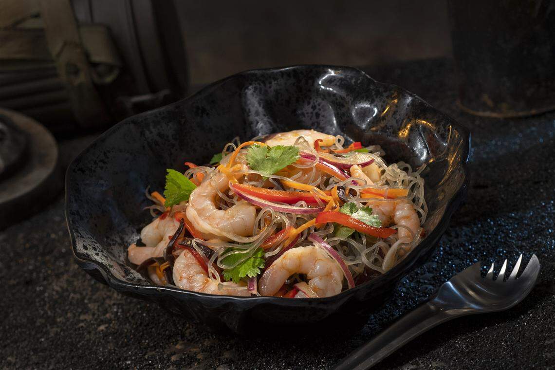 The Yobshrimp Noodle Salad, found at Docking Bay 7 Food and Cargo inside Star Wars: Galaxy’s Edge in Disneyland, is a marinated noodle salad with chilled shrimp.