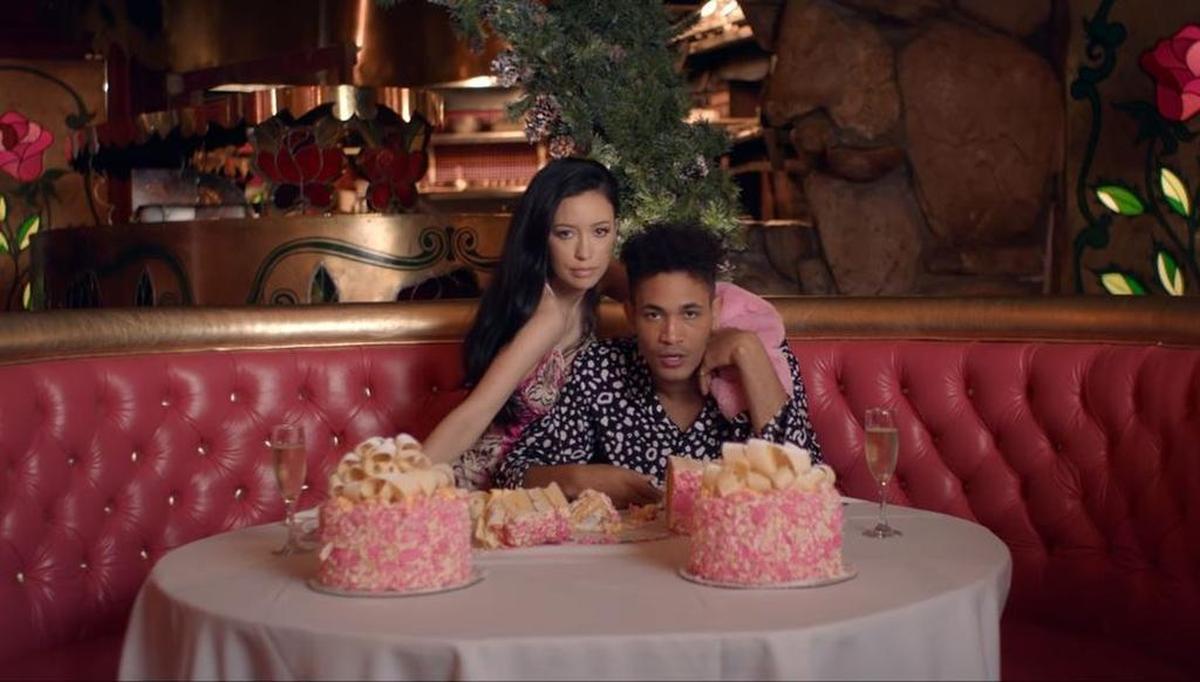 Rapper Bryce Vine and actress Christian Serratos snack on Madonna Inn cakes in San Luis Obispo in Vine’s music video for the song “Drew Barrymore.”