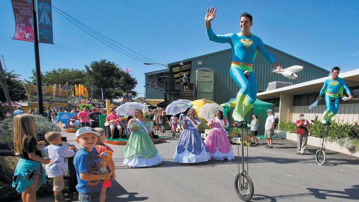 The Midway Spectacular parade makes its way through the California Mid-State Fair during last year’s event.