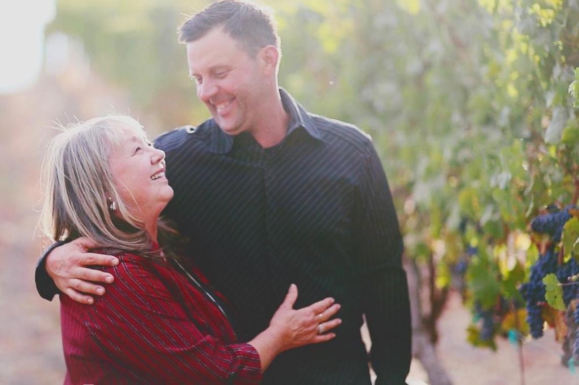 Joe Barton Jr., winemaker at Barton Family Wines and Grey Wolf Cellars in Paso Robles, poses for a picture with his mother, Shirlene. She and her late husband, Joe Barton Sr., established Grey Wolf Cellars in 1994.