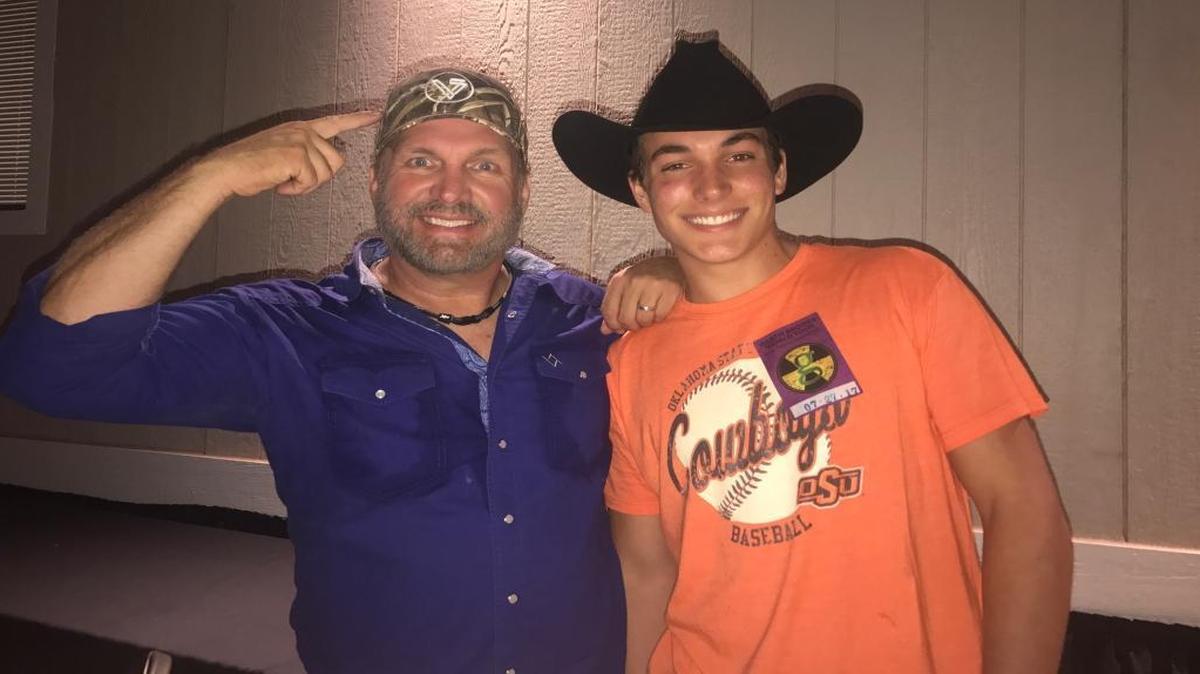 Arroyo Grande High School graduate Jack Ventura, right, poses for a photo with country star Garth Brooks at the California Mid-State Fair in Paso Robles on July 27, 2017. Brooks wears a hat sporting the words “17 Strong,” the name of the nonprofit started by late Arroyo Grande High grad Ryan Texeira.