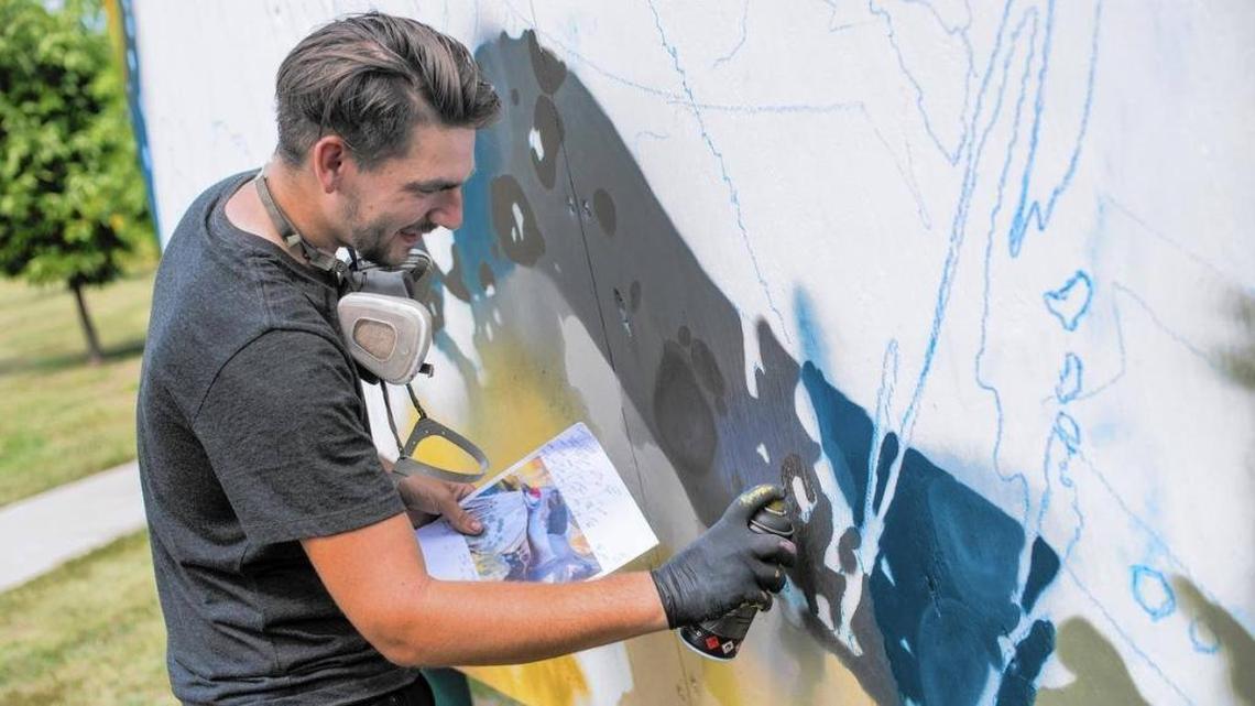 Street artist Ryan “Arcy” Christensen will paint photorealistic murals daily at the California Mid-State Fair in Paso Robles.