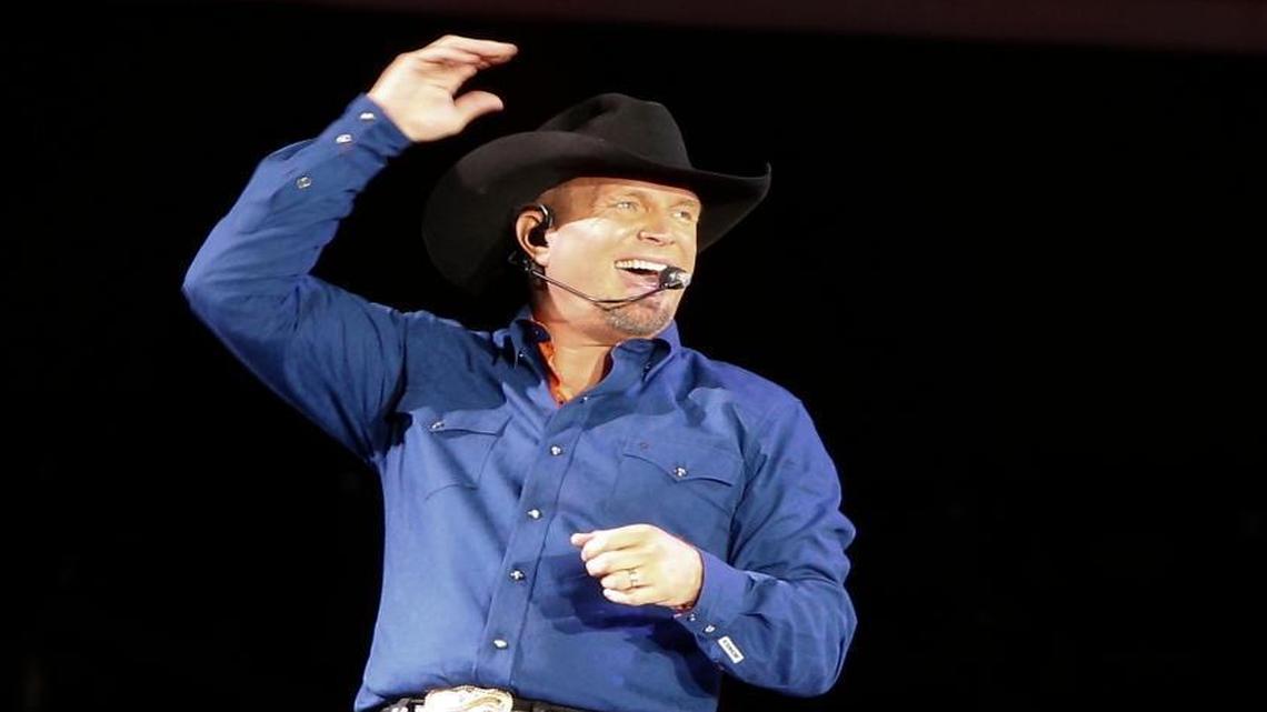 Garth Brooks sings “Ain’t Going Down” during a 2016 concert at Yankee Stadium in New York. Brooks and his wife, Trisha Yearwood, will perform Thursday at the California Mid-State Fair in Paso Robles.