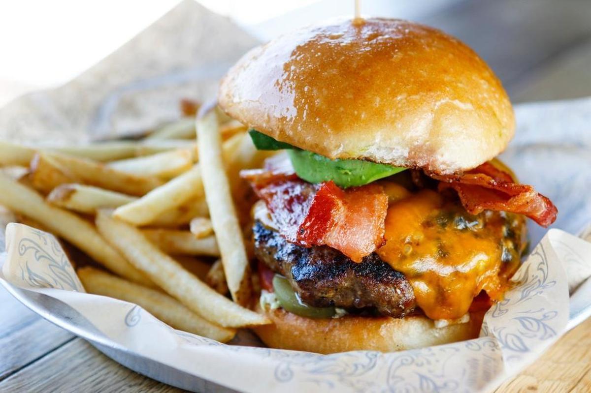 Sliders are paired with locally brewed beer and cider at the Burgers and Brews Festival and Competition on Sunday at Santa Margarita Ranch.