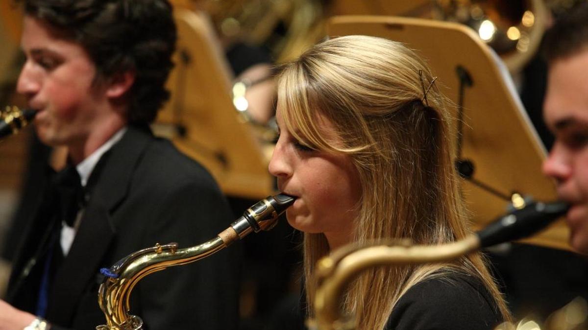 Saxophone players Claire Ropkw and Joey Balducci perform with the Cal Poly Wind Ensemble.