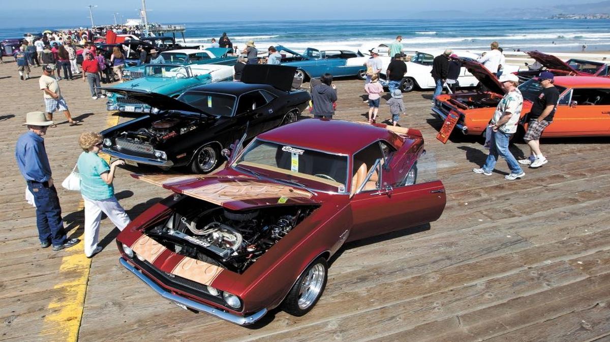 Gene and Brenda Cronon of Tulare check out Dan Wrzenski’s 1967 Camaro on the Pismo Beach Pier. The Classic at Pismo Beach runs Friday through Sunday in downtown Pismo Beach.