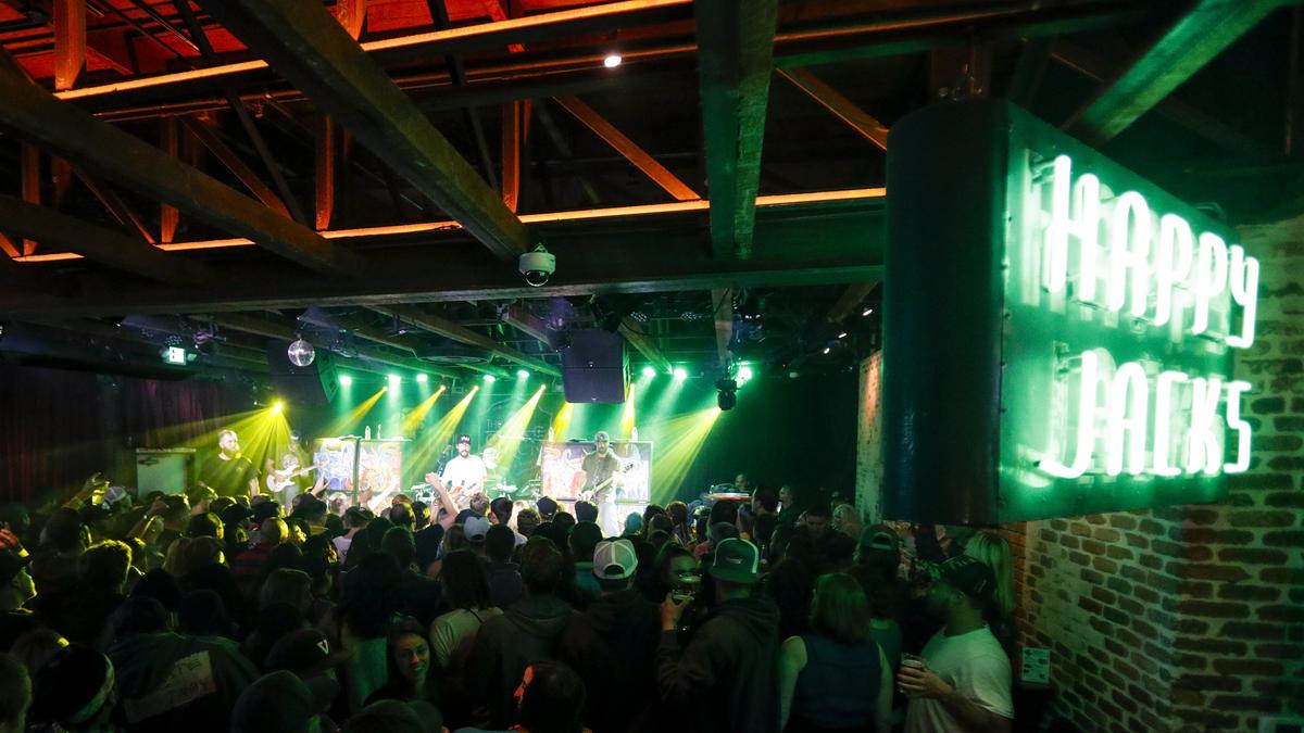 Reggae rock band The Expendables perform April 18 at The Siren, a former dive bar that's become a hot concert venue in Morro Bay. The venue was once known as Happy Jacks; now a neon sign from that era is part of the decor.