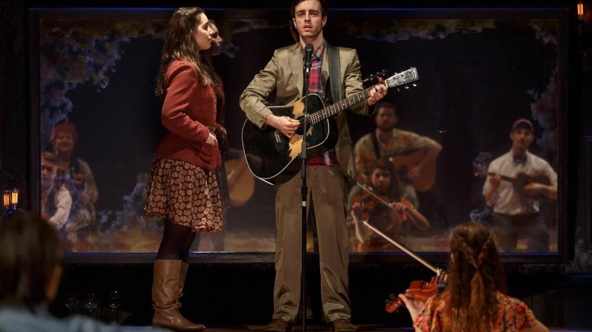 Girl (Mackenzie Lesser-Roy) listens to Guy (Sam Cieri) perform in a scene from the musical “Once.” The touring production stops Oct. 30 at the Performing Arts Center in San Luis Obispo.