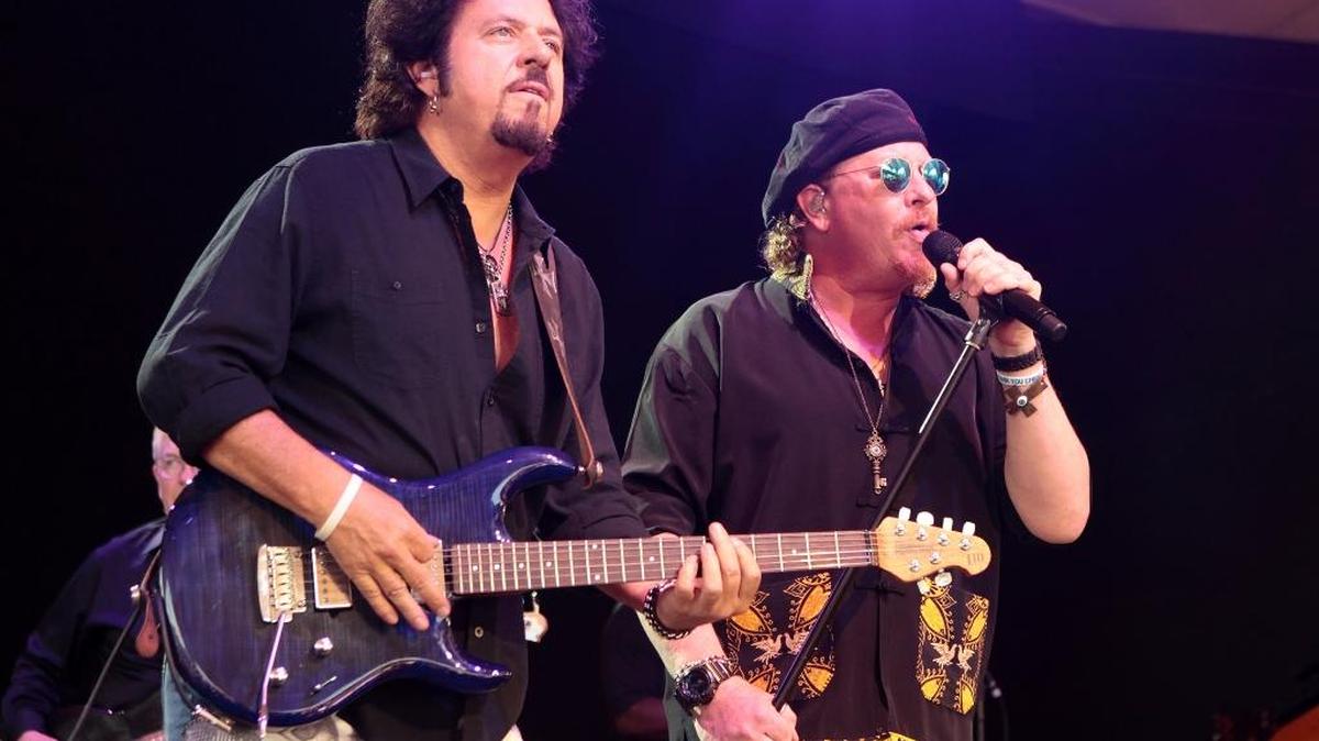 Steve Lukather, left, and Joseph Williams of the band Toto perform in Baltimore last year.