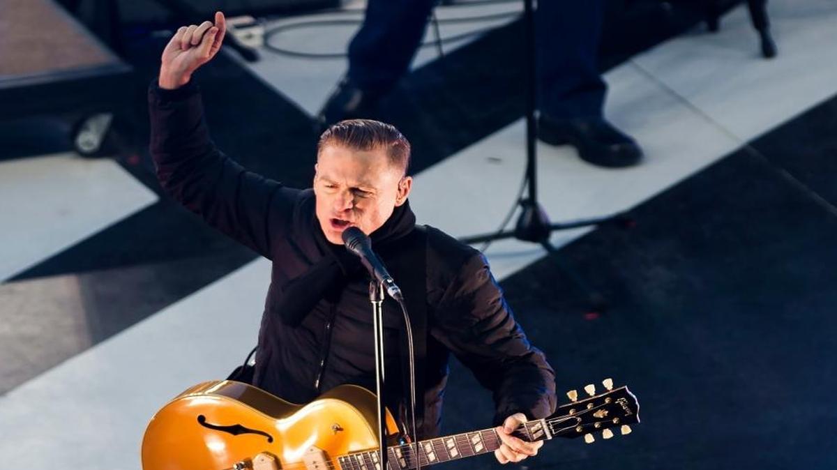 Canadian singer Bryan Adams performs during the first intermission at the NHL Centennial Classic hockey game between the Detroit Red Wings and the Toronto Maple Leafs in Toronto on Jan. 1, 2017.