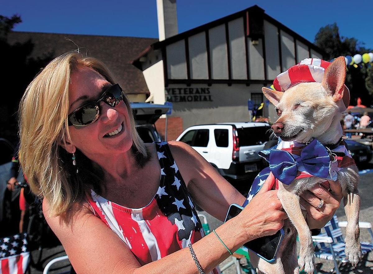 Ronette Sutherland of Colorado gets into the Pinedorado spirit with Rocco, an 8-year-old Chihuahua.