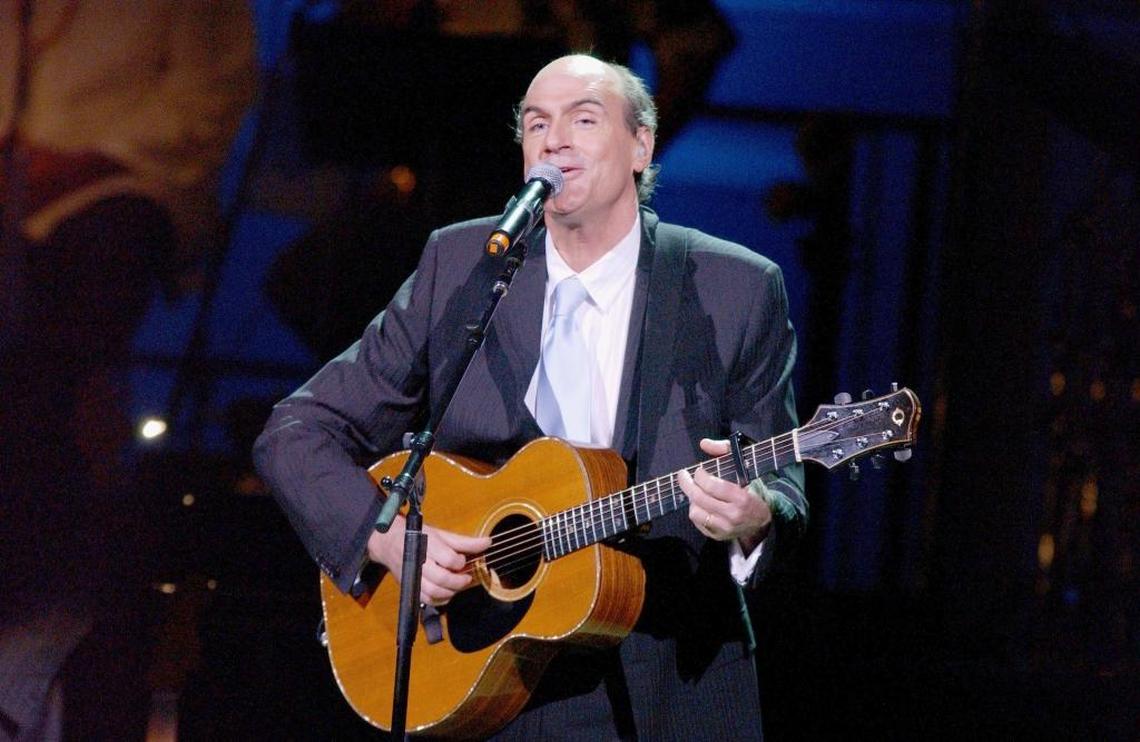 James Taylor performs during the 2006 Rainforest Foundation Fund benefit concert. He’ll play the Santa Barbara Bowl in May 2026.