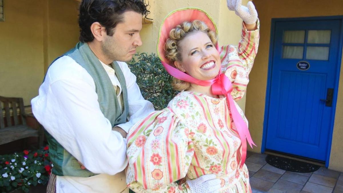 Painter Marcello (John Viscardi) and his flirtatious former girlfriend, singer Musetta (Jennie Litster), are among the characters in Opera San Luis Obispo’s production of “La Bohème.”