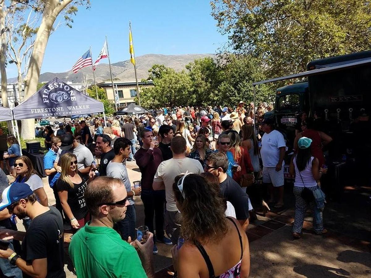 Festivalgoers line up for beverages at Brews & Bites in 2016. The festival returns to Mission Plaza in downtown San Luis Obispo on Saturday.