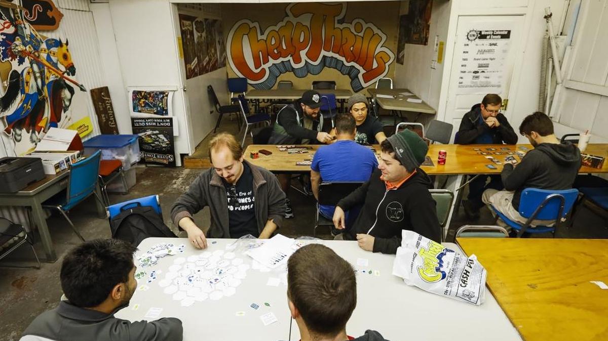 Players gather at a recent Captain Nemo Comics & Games Open Board Game Night.