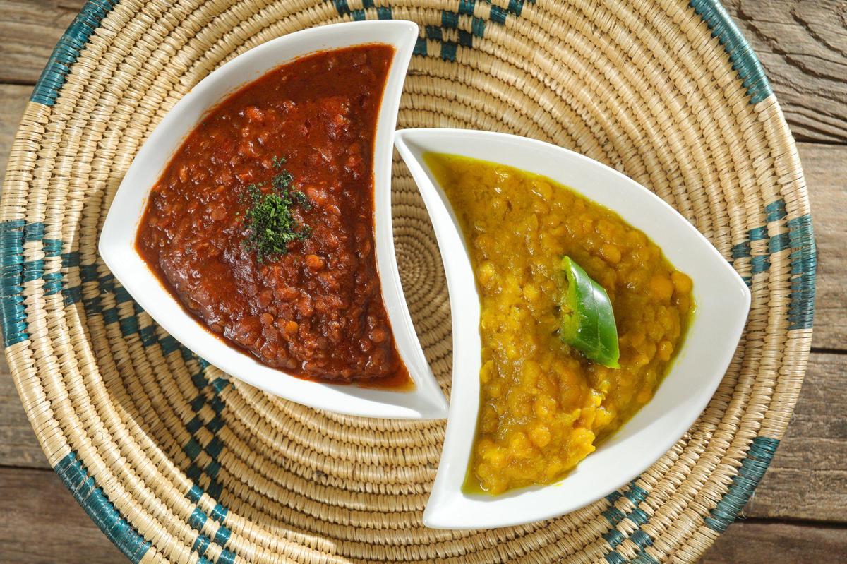 Misir Wot (red lentils), left, and Ater Alicha (split peas) are two of the items on Ebony’s vegan menu. The new Ethiopian restaurant is the only one of its kind in in San Luis Obispo County.