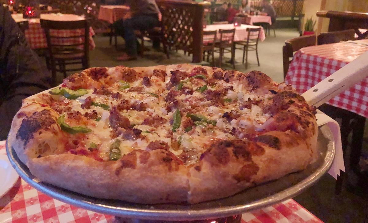 The Big Ed’s Sure Thing pizza from Del’s Pizzeria & Italian Restaurant in Pismo Beach comes with sausage, meatballs, tomato, garlic and onion.