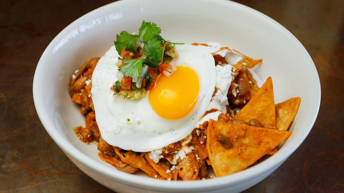 Chilaquiles are topped with a fried egg at Rosalina in Santa Margarita.