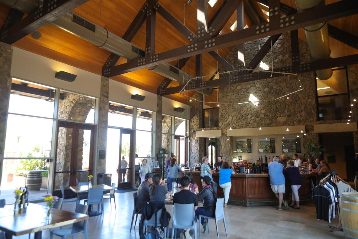 High ceilings and expansive windows give the dining room at Niner Wine Estates in Paso Robles an open feel.