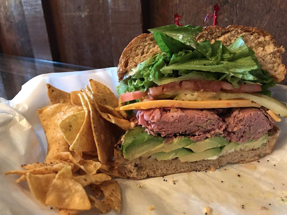 Menu options at Cafe on Bridge Street in Cambria include this sandwich with sliced beef, cheddar cheese and avocado.