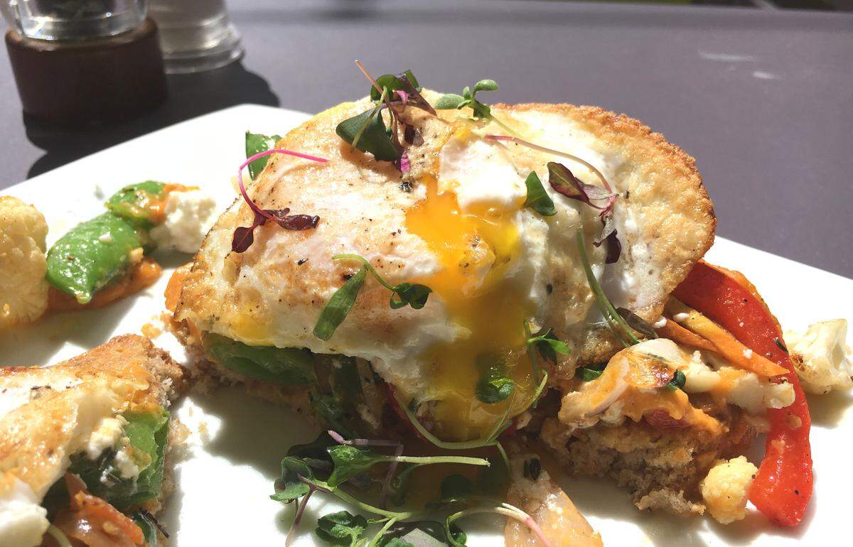 The SLO Market toastie at Mint + Craft Cafe and Mercantile features roasted veggies, goat feta cheese, sweet potato spread, za'atar spice and an egg on whole-grain bread.