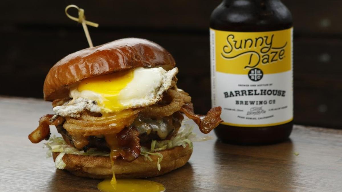 The Golden State burger at Brooks Burgers in Pismo Beach features bacon, fried onions, egg, Colby Jack cheese and Boss sauce.