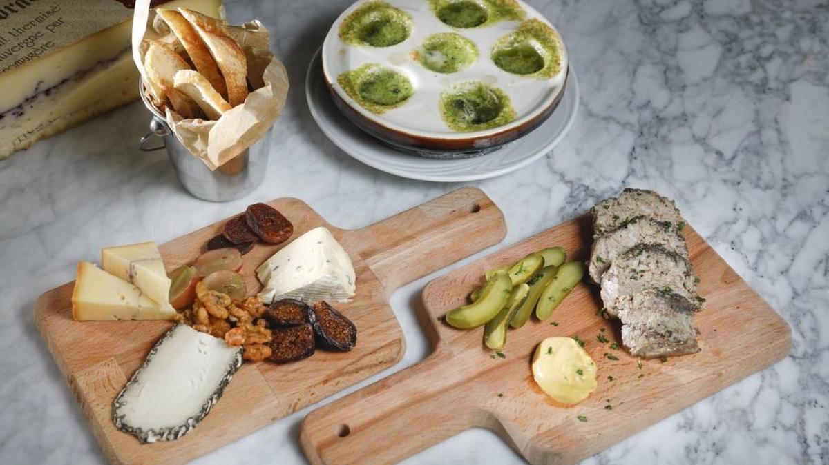 Small plates at Blue Moon Over Avila in Avila Beach include escargot, a cheese platter and steak tartare.