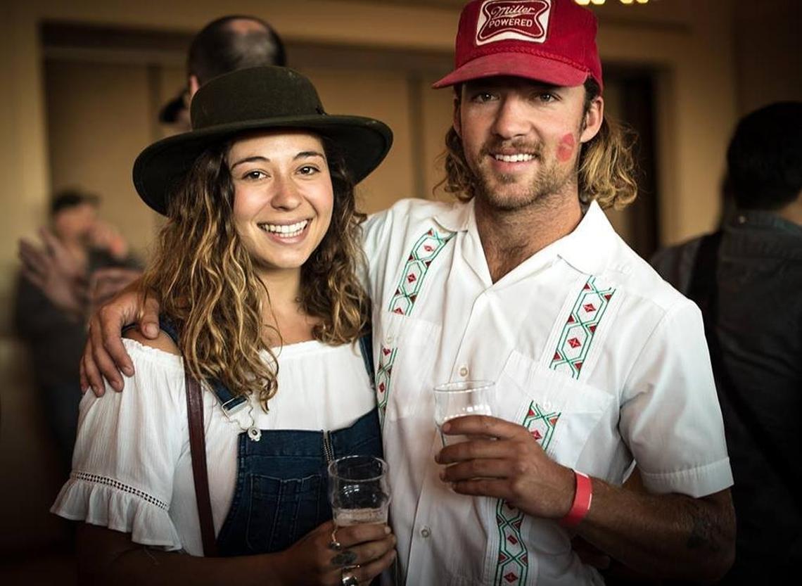 Two festivalgoers pose for a picture at the Central Coast Cider Festival in Atascadero. The festival will return to Atascadero in May 2017.