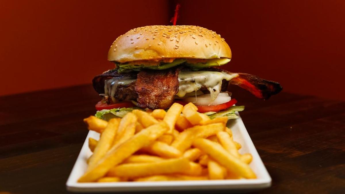 A Nino’s burger with avocado, bacon and jack cheese is among the hearty offerings at Nino’s Grill in Templeton.