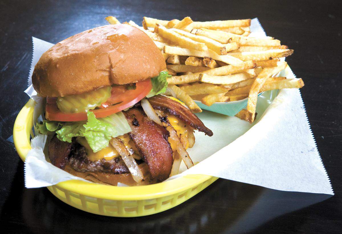 The Wee Shack Burger Café in Morro Bay features the Wee-Man burger with jalapeño-flavored bacon and sauteed onions, served here with hand-cut fries. Read more »