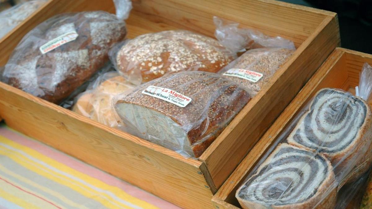 Patrons of La Migliore Italian Bakery’s booth at the Saturday San Luis Obispo farmers market can choose from about 15 different breads.