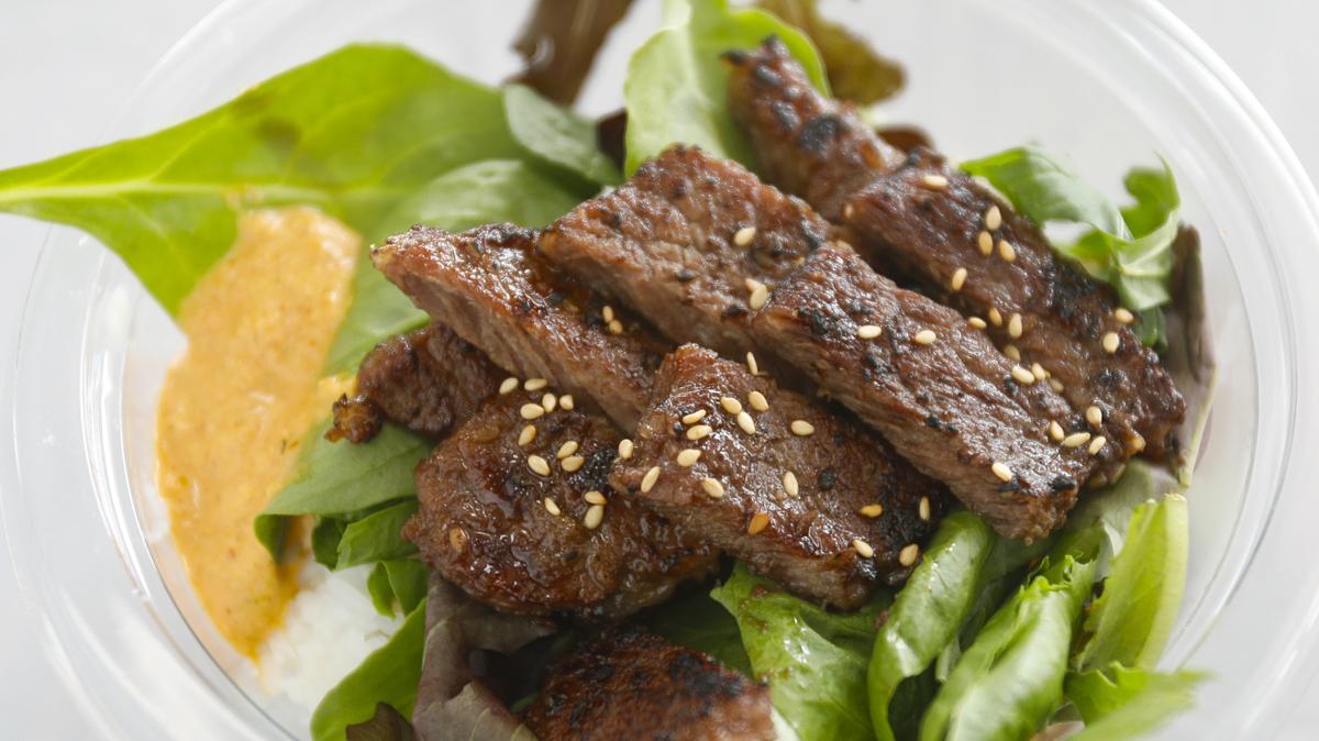 Marinated beef short ribs top a Seoul bowl from the Feed My Seoul food truck.