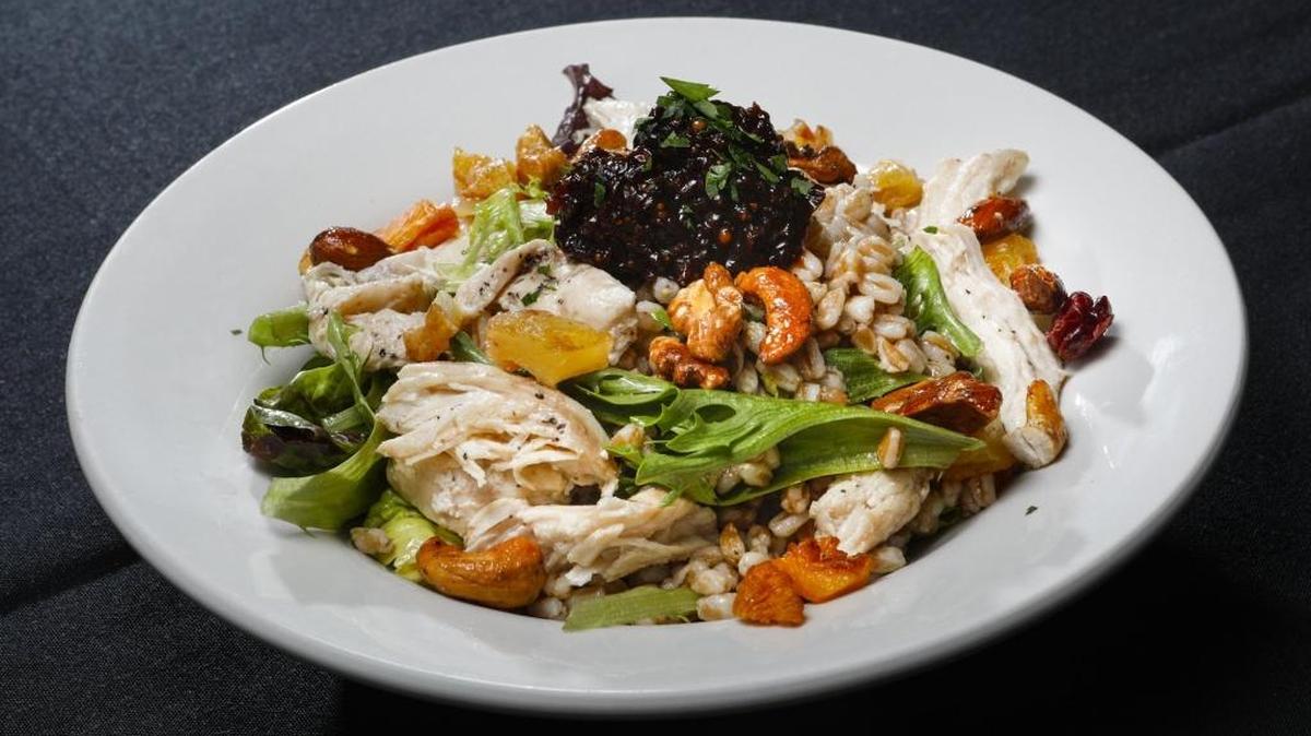 The Italian Grain Salad at Next Door Bistro in Paso Robles features chicken, nuts, grains and greens.
