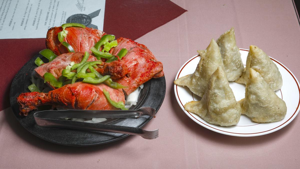 Tandoori chicken and vegetable samosas are among the Indian food favorites at Taj Palace in San Luis Obispo.